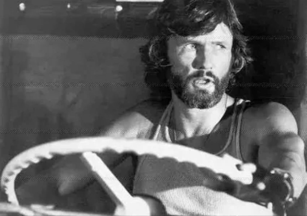 Kris Kristofferson’s “Breakdown (A Long Way From Home)”: A Journey of Self-Discovery on the Open Road